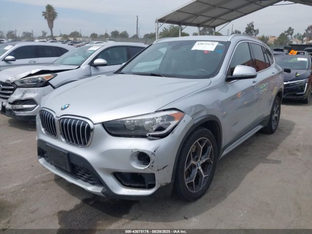 2018 BMW X1 WBXHU7C34J5H41848 Photo 1