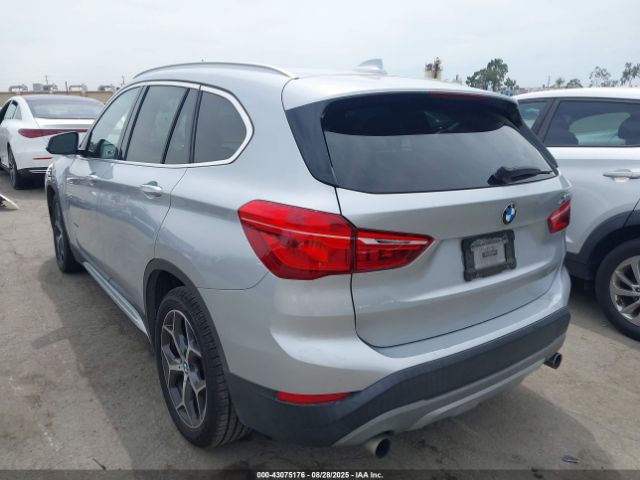 2018 BMW X1 WBXHU7C34J5H41848 Photo 2