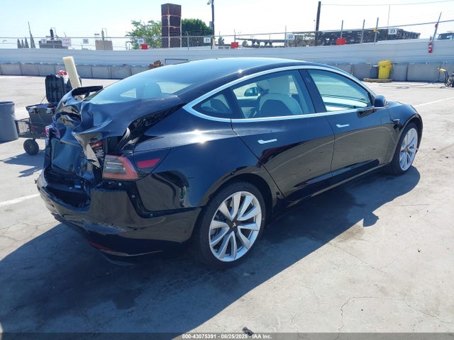 5YJ3E1EA5JF177846 Tesla 2018