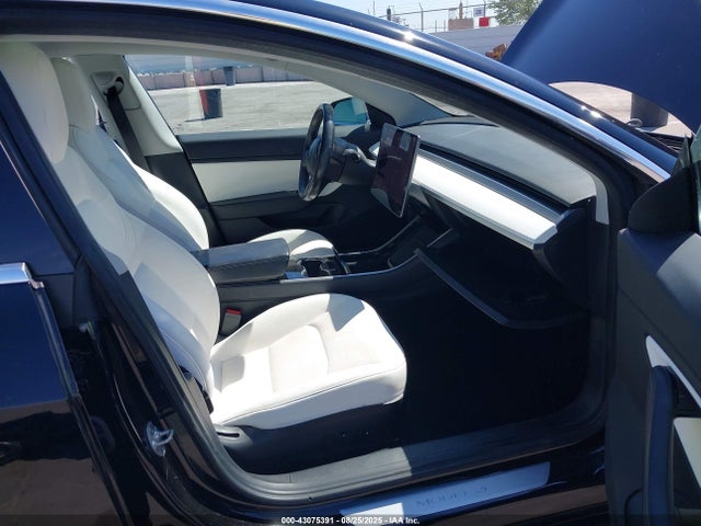 5YJ3E1EA5JF177846 Tesla 2018
