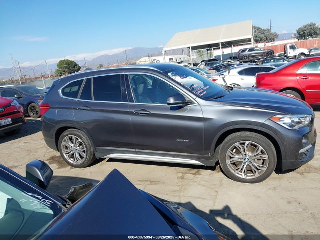 WBXHT3Z37G4A49312 BMW X1