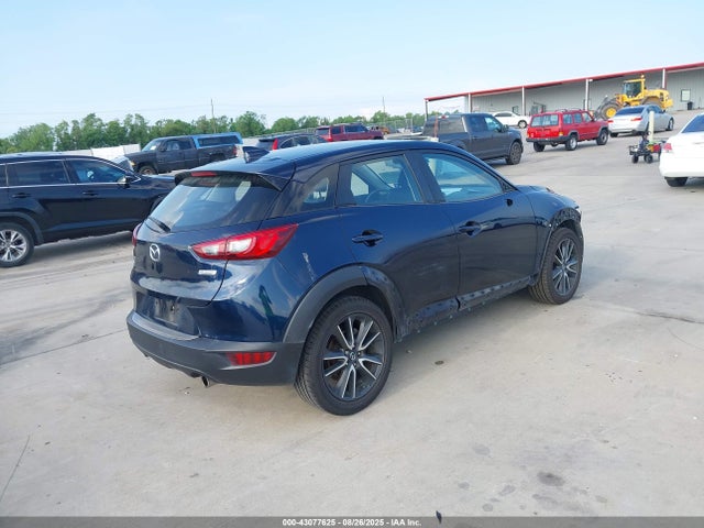 Mazda pe 2016 JM1DKBD77G0113615 Image 4
