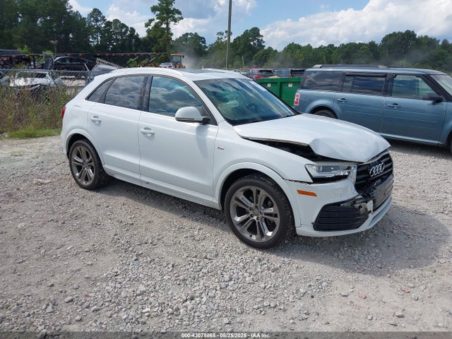 2016 AUDI Q3 WA1GFCFS6GR004867 Photo 0
