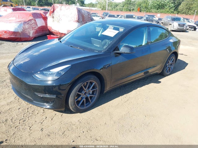 2023 TESLA MODEL 3 5YJ3E1EA1PF638694 Photo 1