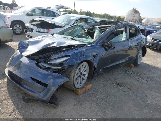 2021 TESLA MODEL 3 5YJ3E1EAXMF876670 Photo 1