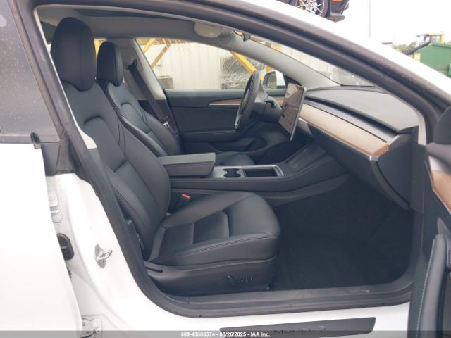 2023 TESLA MODEL 3 5YJ3E1EA6PF548439 Photo 4