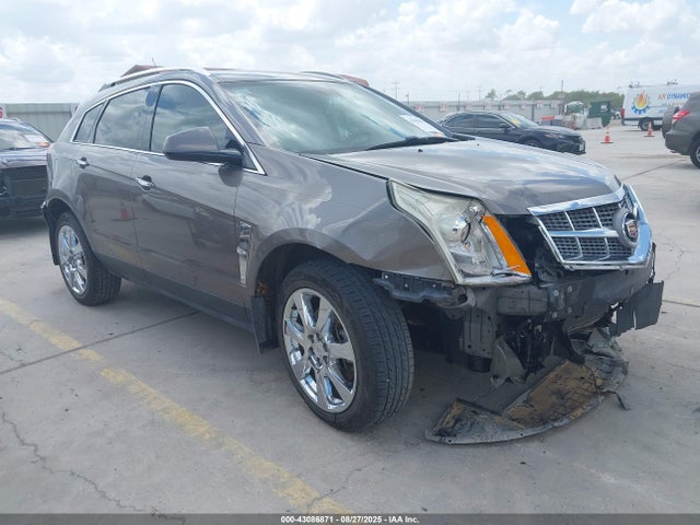 2011 CADILLAC SRX 3GYFNBEY4BS615954 Photo 0