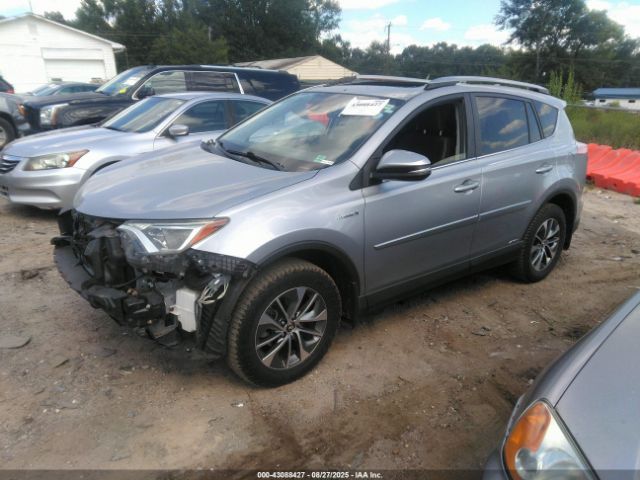 2018 TOYOTA RAV4 HYBRID JTMRJREV3JD248220 Photo 1