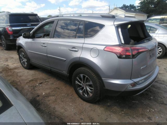 2018 TOYOTA RAV4 HYBRID JTMRJREV3JD248220 Photo 2