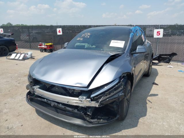 2026 TESLA MODEL Y 7SAYGDED3TA428278 Photo 1