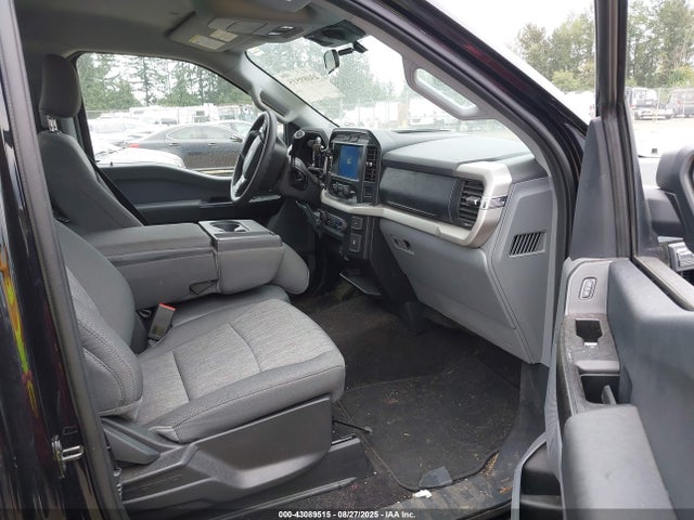 1FTMF1EB9MKF09112 Ford tivct