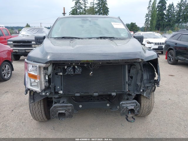 1FTMF1EB9MKF09112 Ford tivct