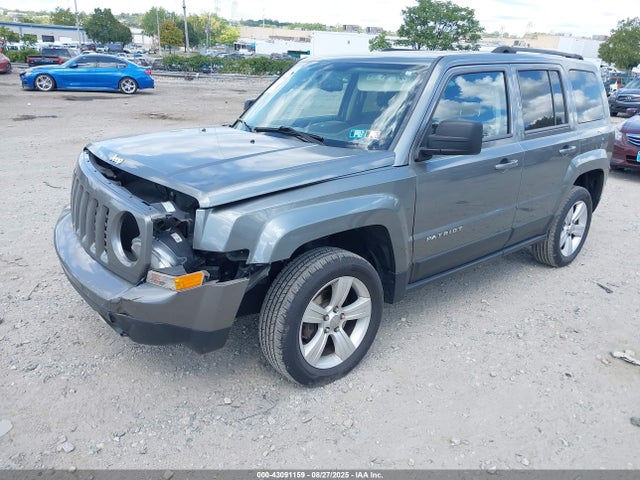 1C4NJRFBXED549303 Jeep 2014