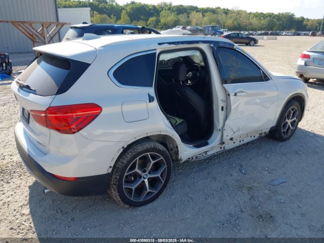2018 BMW X1 WBXHT3C32J3H31519 Photo 3