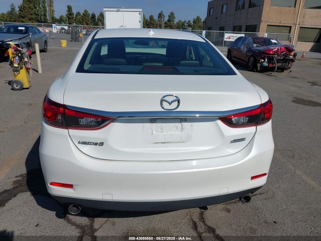 JM1GJ1V53G1445732 Mazda py
