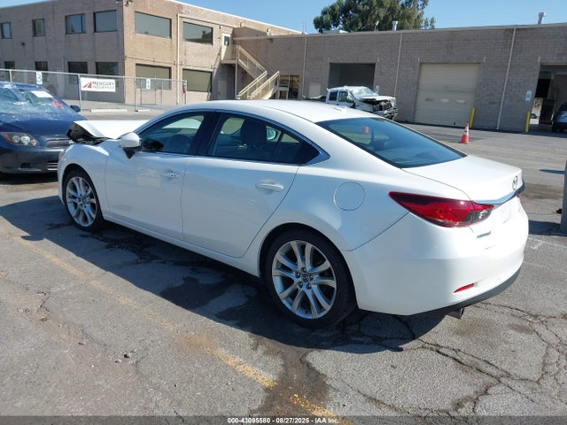 JM1GJ1V53G1445732 Mazda py