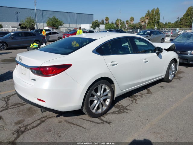 JM1GJ1V53G1445732 Mazda py