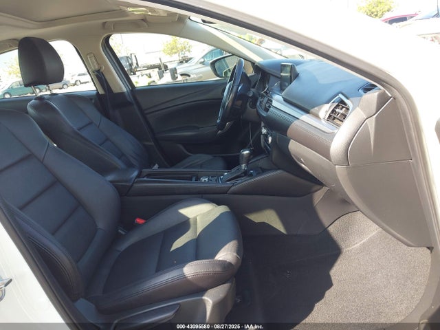 JM1GJ1V53G1445732 Mazda py