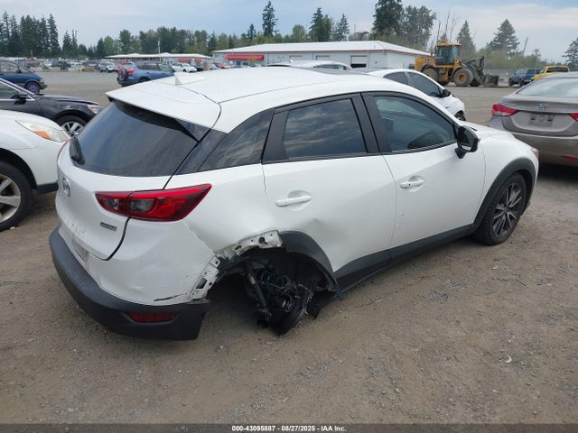 Mazda pe 2017 JM1DKFC79H0165662 Image 4
