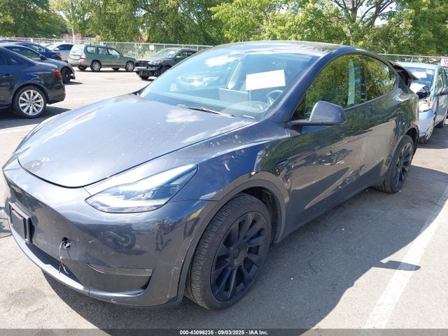 2024 TESLA MODEL Y 7SAYGDEE9RA254184 Photo 1