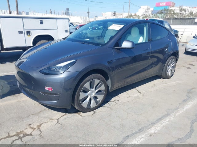 2023 TESLA MODEL Y 7SAYGDEE5PF877835 Photo 1