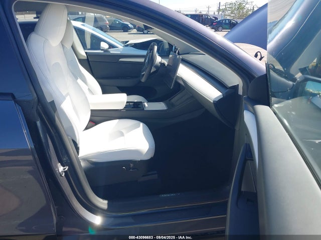 2023 TESLA MODEL Y 7SAYGDEE5PF877835 Photo 4