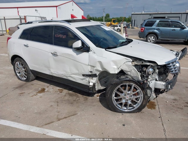 2014 CADILLAC SRX 3GYFNCE38ES561623 Photo 0