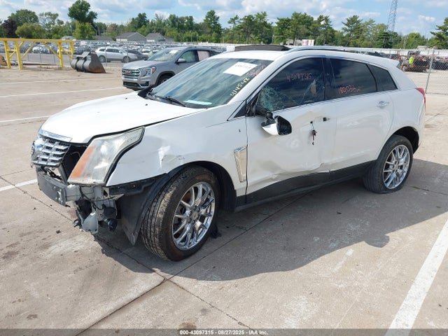 2014 CADILLAC SRX 3GYFNCE38ES561623 Photo 1
