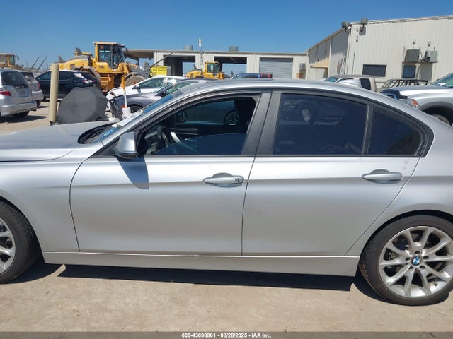 WBA3B1C5XEK134592 BMW 320i