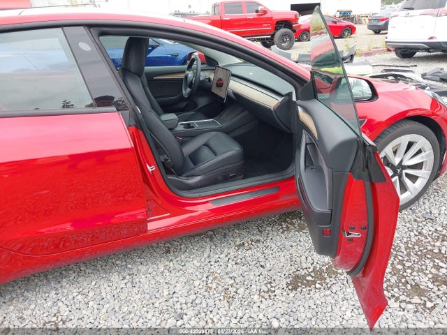 2023 TESLA MODEL 3 5YJ3E1EAXPF452281 Photo 4