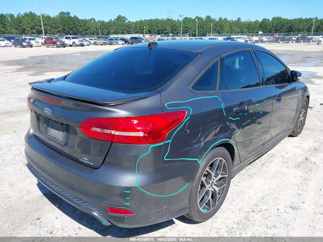 Ford Focus 2015 1FADP3F28FL215680 Image 4