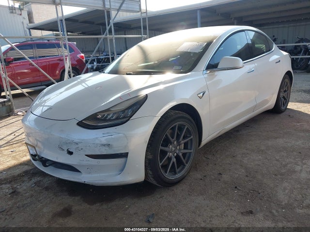 5YJ3E1EA9JF017324 Tesla 2018