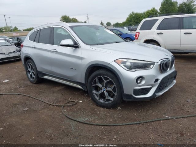 2017 BMW X1 WBXHT3Z30H4A53557
