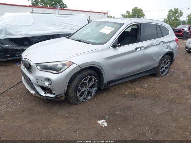 2017 BMW X1 WBXHT3Z30H4A53557 Photo 1