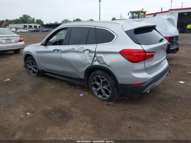 2017 BMW X1 WBXHT3Z30H4A53557 Photo 2