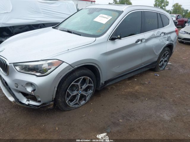 2017 BMW X1 WBXHT3Z30H4A53557 Photo 5