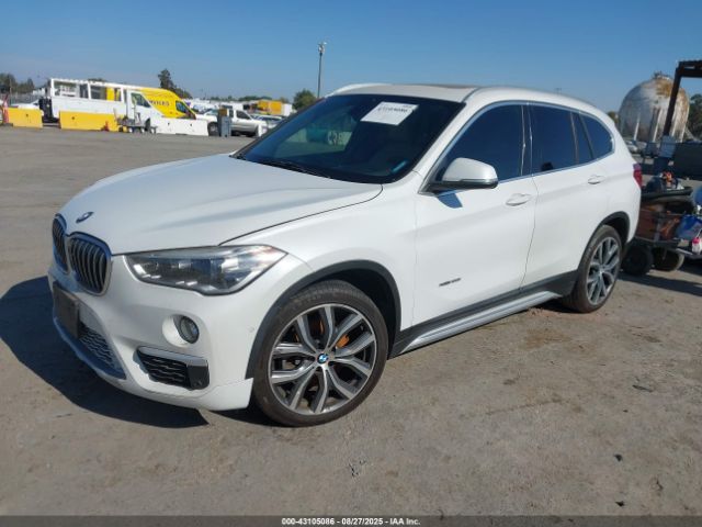 2016 BMW X1 WBXHT3C30GP882728 Photo 1