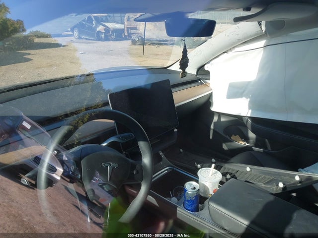 5YJ3E1EA4PF569743 Tesla 2023