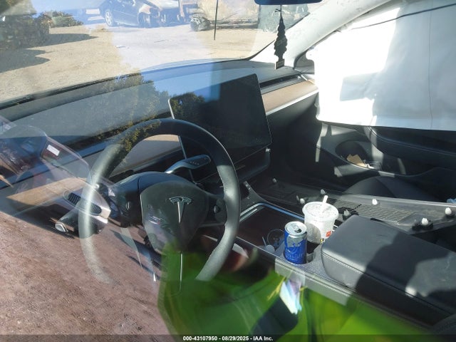 5YJ3E1EA4PF569743 Tesla 2023
