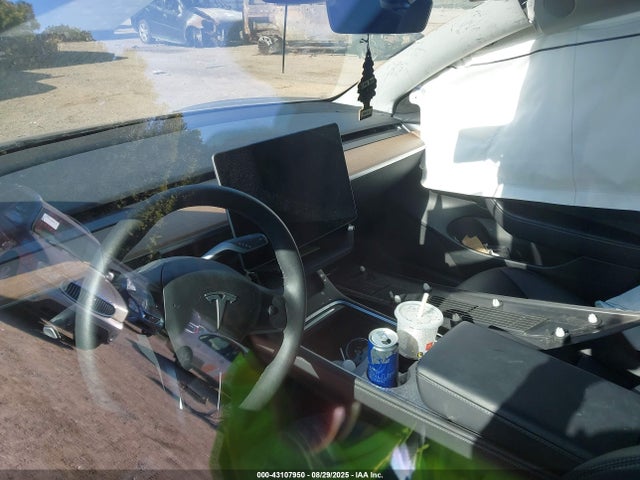 5YJ3E1EA4PF569743 Tesla 2023