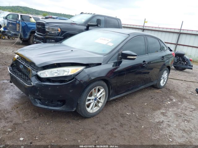 2015 FORD FOCUS 1FADP3F2XFL280157 Photo 1