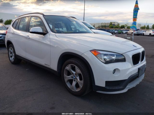 2015 BMW X1 WBAVM1C51FVW57700