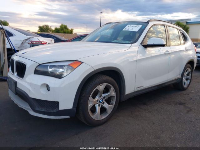 2015 BMW X1 WBAVM1C51FVW57700 Photo 1