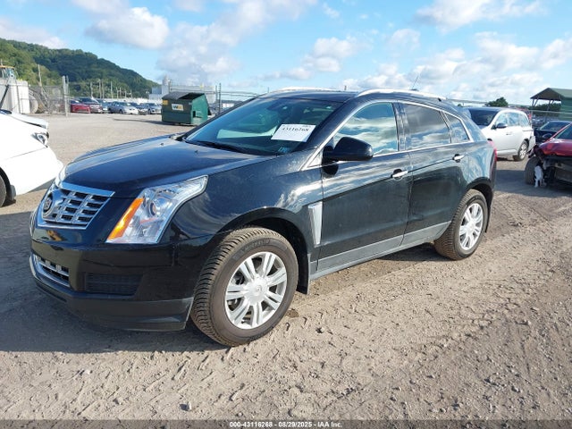 2016 CADILLAC SRX 3GYFNEE3XGS569558 Photo 1