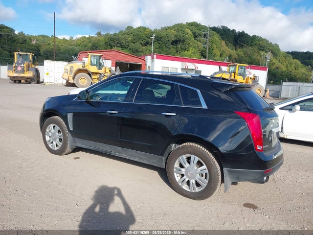 2016 CADILLAC SRX 3GYFNEE3XGS569558 Photo 2