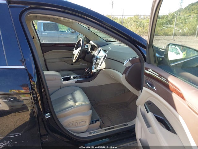 2016 CADILLAC SRX 3GYFNEE3XGS569558 Photo 4