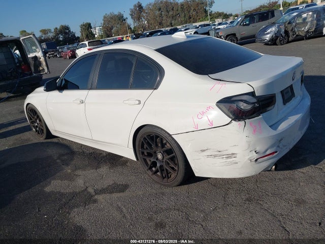 2016 BMW 320I WBA8A9C57GK618763 Photo 2