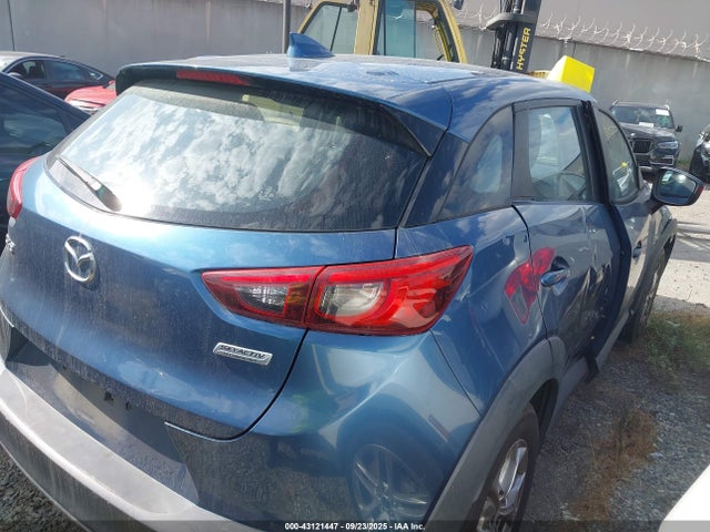 Mazda pe 2019 JM1DKDB74K0410350 Image 4