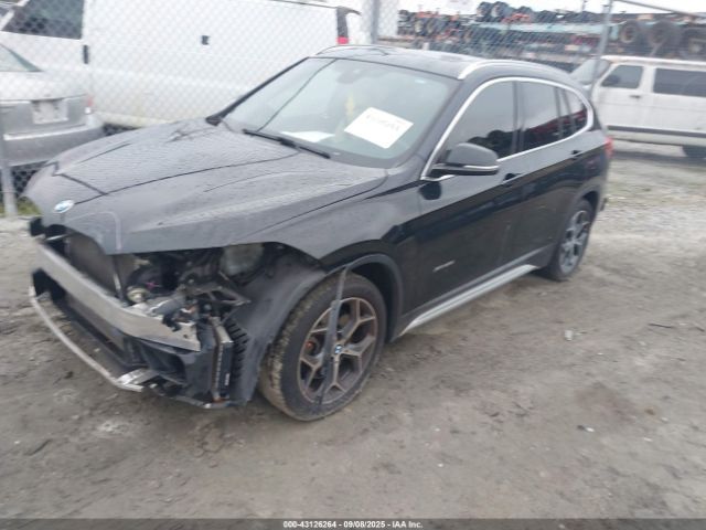 2016 BMW X1 WBXHT3C39G5E52713 Photo 1