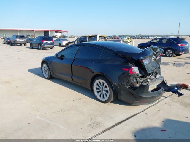 2023 TESLA MODEL 3 5YJ3E1EA5PF671925 Photo 2